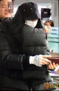 权志龙现身戴着羽绒围巾包裹严实不露脸被粉丝笑称像面包娱乐hot