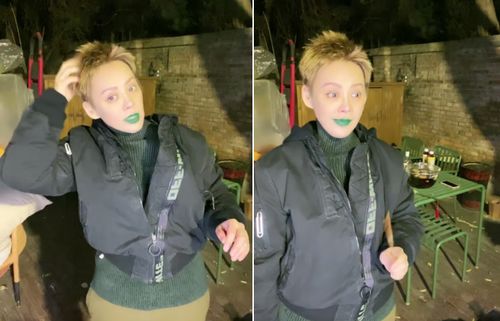 宁静豪宅内直播吃烧烤涂绿色口红表情霸气,敞开棉袄秀小蛮腰